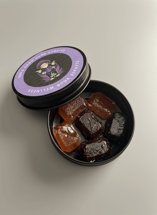 Nano-infused D9 THC hard candy by I Am Hemp Inc, 50mg edibles in colorful packaging on a white background.