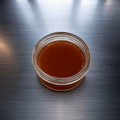 Purple-colored I Am Hemp Inc CBDa live resin concentrate, 1 gram, with 89.9% CBDa potency, in a sleek purple gas-themed container.