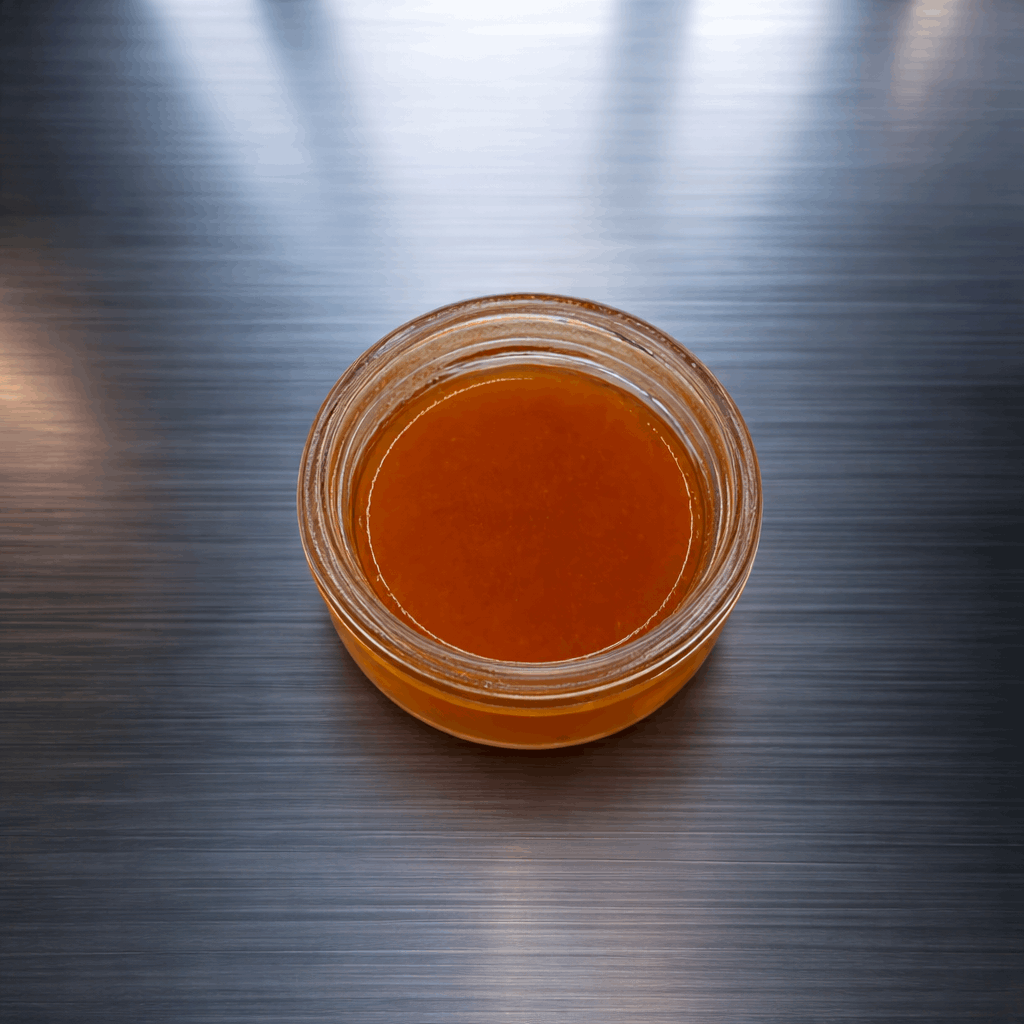 I Am Hemp Inc 1 Gram CBDa Live Resin concentrate with sour Warheads flavor, showcasing a jar of CBD extract and sour candy imagery.